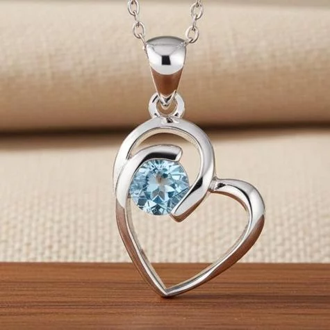 Sterling Silver Blue Topaz Heart Pendant
