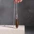 Gold Tiger's Eye Dowsing Pendulum with Pouch and Instructions