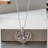 Sterling Silver Lovebirds Heart Pendant